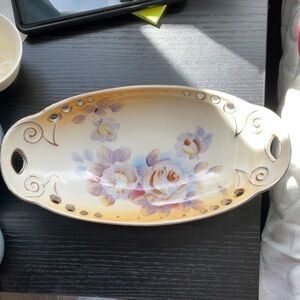 Antique hand-painted reticulated porcelain dish.